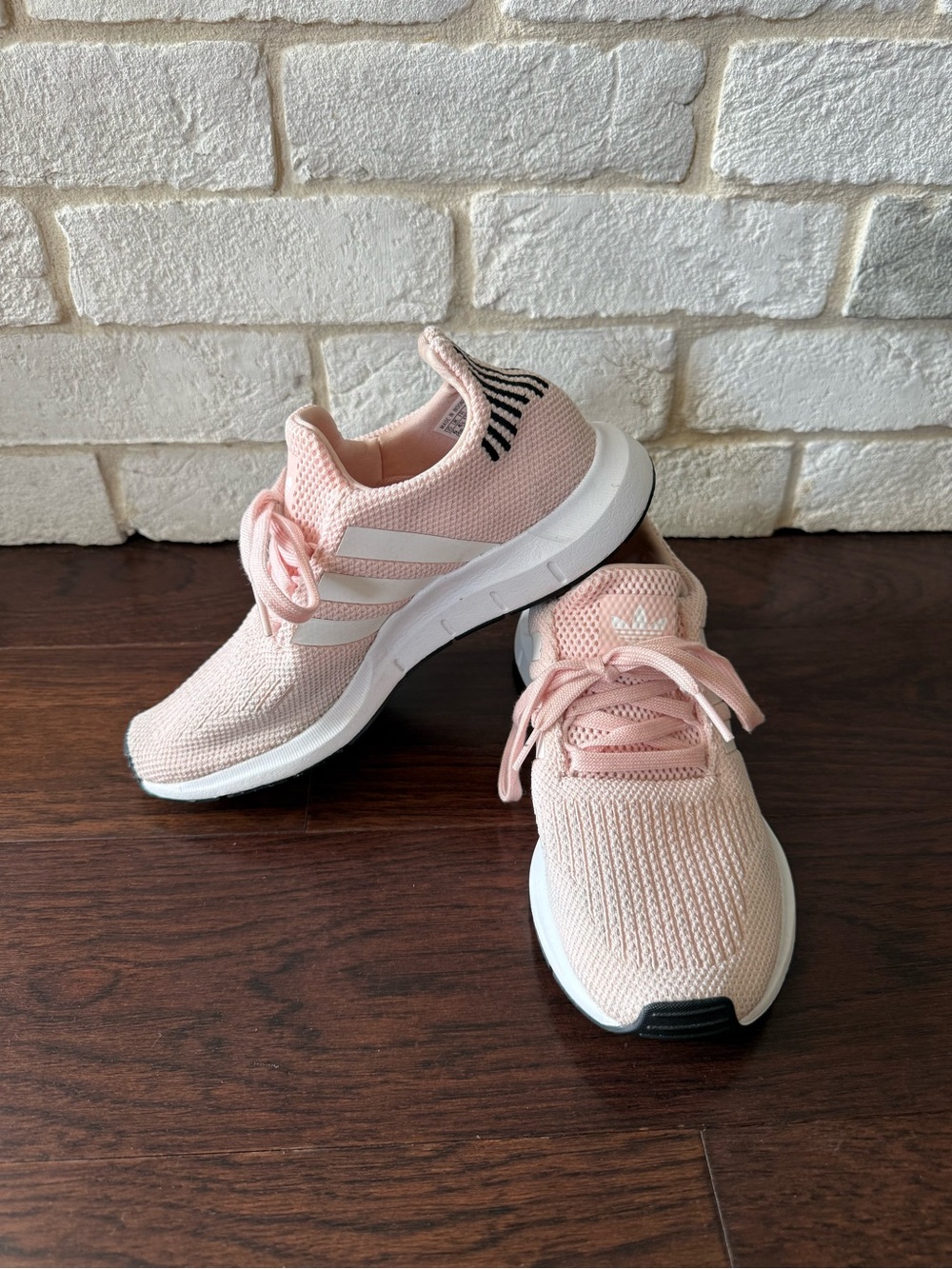 Adidas Swift Run Sneaker in Light Pink